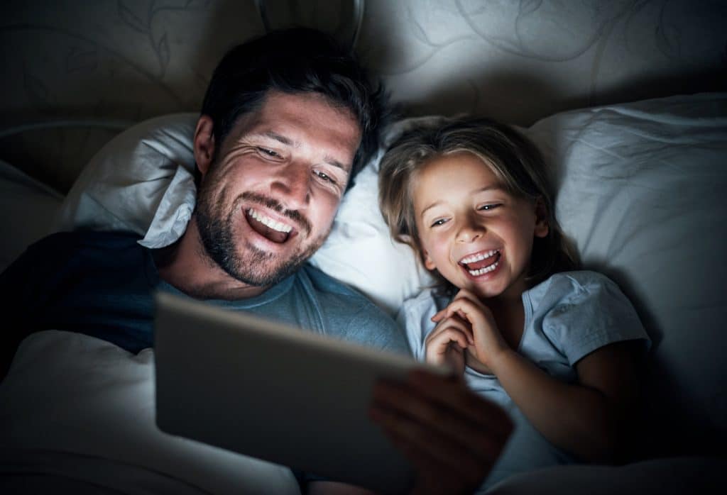 Girl and Dad Using Tablet